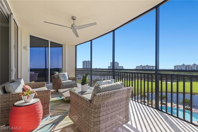 sunroom with ceiling fan