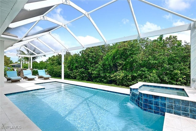 101 Bald Eagle Dr, Marco Island, FL 34145 - view of swimming pool featuring a patio area, glass enclosure, and a pool with connected hot tub