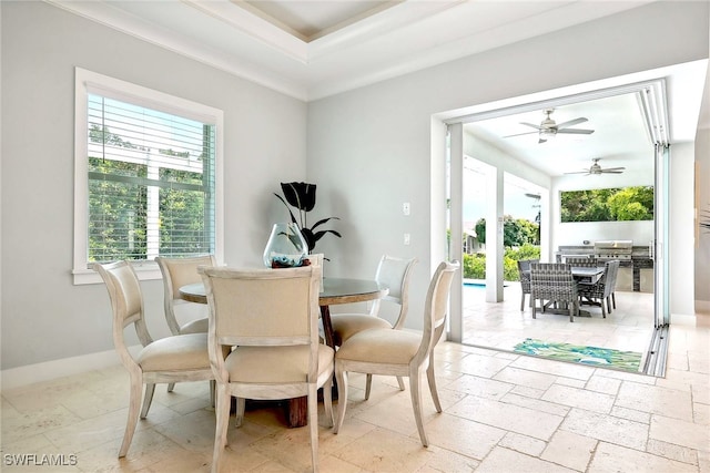 dining room featuring ceiling fan