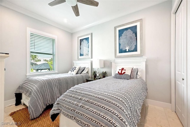 101 Bald Eagle Dr, Marco Island, FL 34145 - bedroom with a closet, baseboards, and ceiling fan