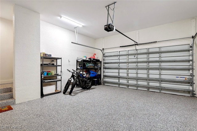 garage featuring a garage door opener