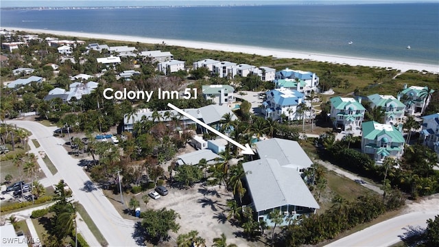 aerial view with a view of the beach and a water view