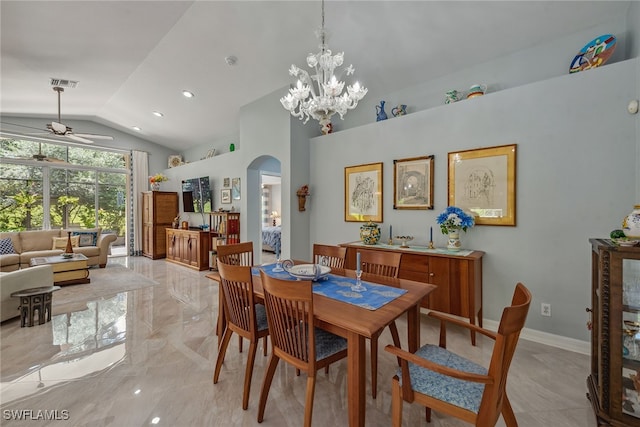 dining space featuring ceiling fan with notable chandelier and lofted ceiling