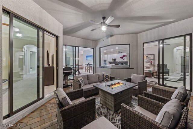 living room featuring ceiling fan