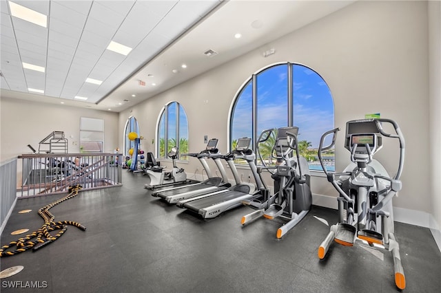 workout area featuring a paneled ceiling