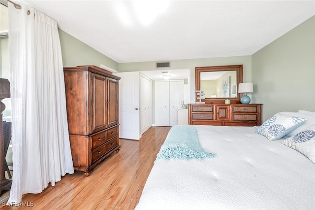 bedroom with light hardwood / wood-style flooring