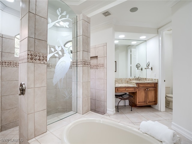 full bathroom featuring vanity, crown molding, shower with separate bathtub, toilet, and tile patterned floors