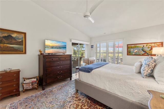 bedroom with lofted ceiling, light tile patterned flooring, and ceiling fan