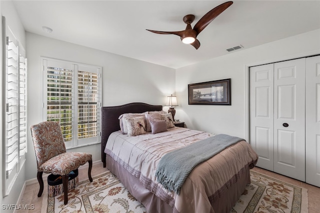 bedroom with a closet and ceiling fan