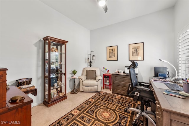 tiled office with ceiling fan