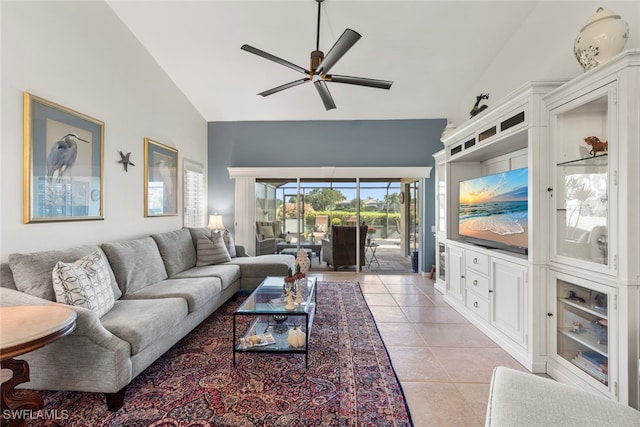 tiled living room with vaulted ceiling and ceiling fan