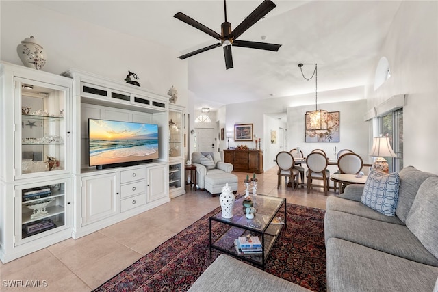 living room featuring ceiling fan and light tile patterned flooring