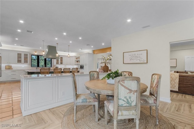 dining area featuring recessed lighting and visible vents