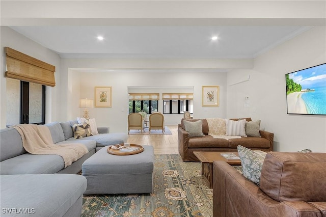 living room with parquet floors and crown molding