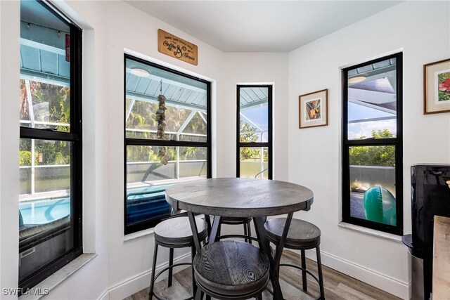 dining room featuring hardwood / wood-style flooring