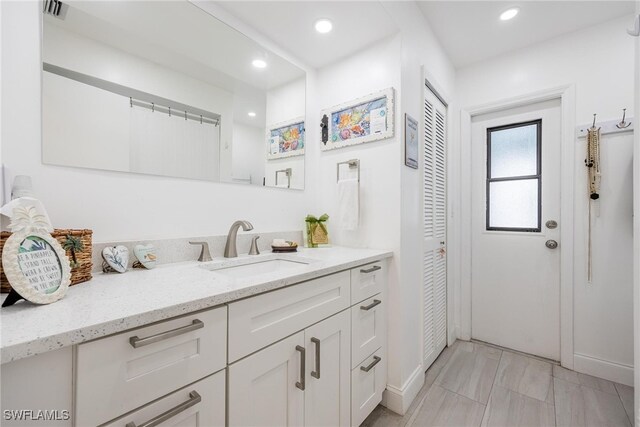 bathroom featuring vanity