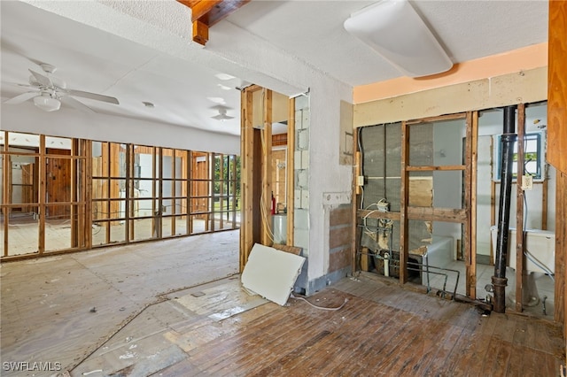 misc room featuring ceiling fan and hardwood / wood-style flooring