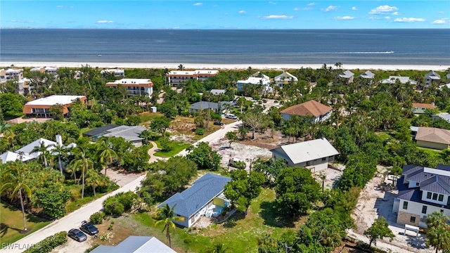 aerial view with a view of the beach and a water view