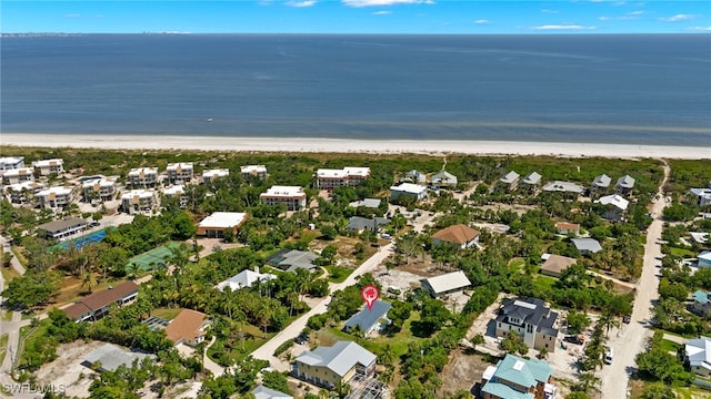 bird's eye view with a view of the beach and a water view