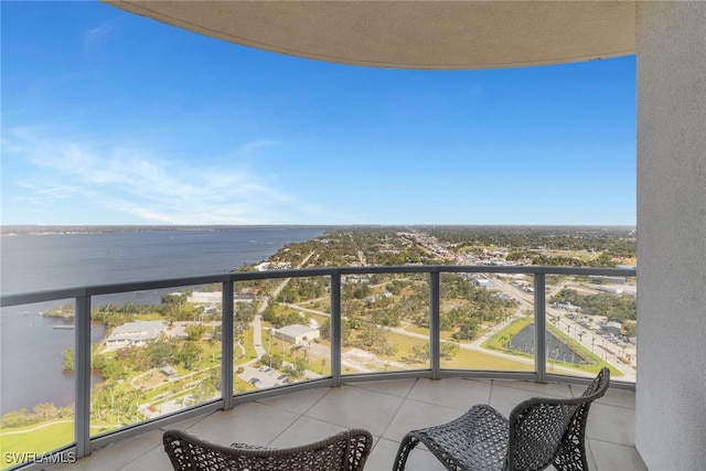 balcony featuring a water view