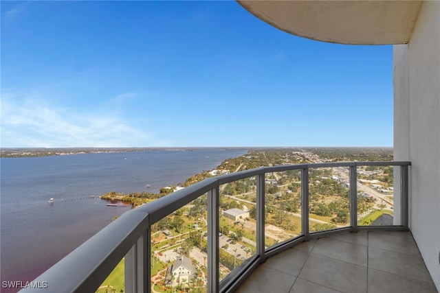 balcony featuring a water view