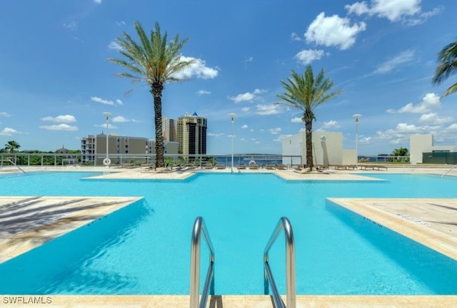 view of swimming pool featuring a patio