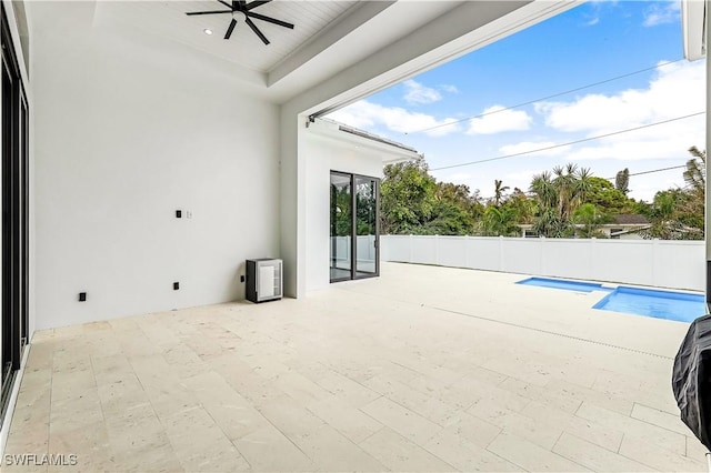 view of pool featuring a patio and ceiling fan