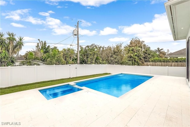 view of swimming pool featuring a patio area