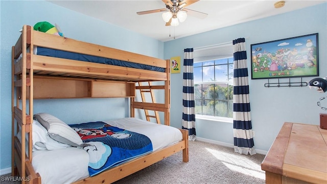 2864 Blossom Ct, Naples, FL 34120 - carpeted bedroom with baseboards and a ceiling fan