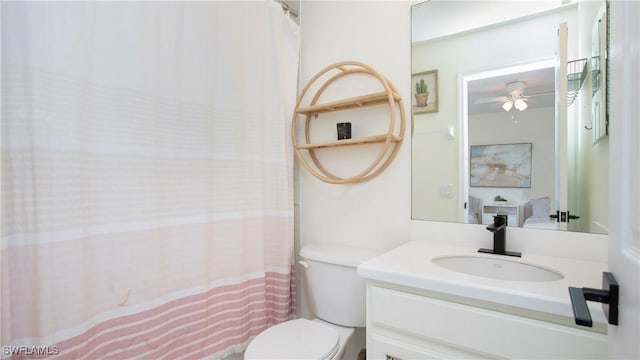 full bathroom featuring vanity and toilet