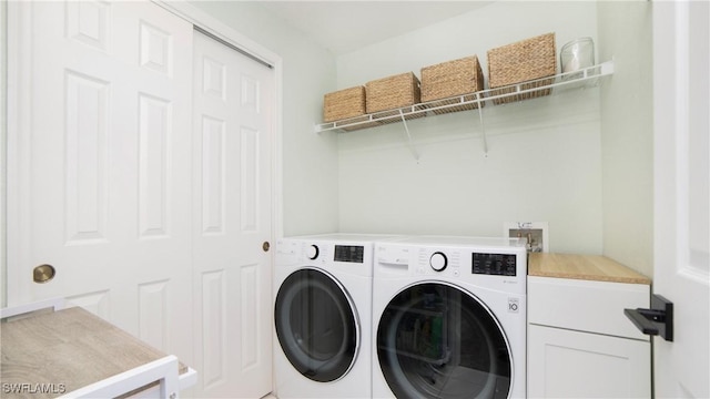 laundry area featuring laundry area and independent washer and dryer