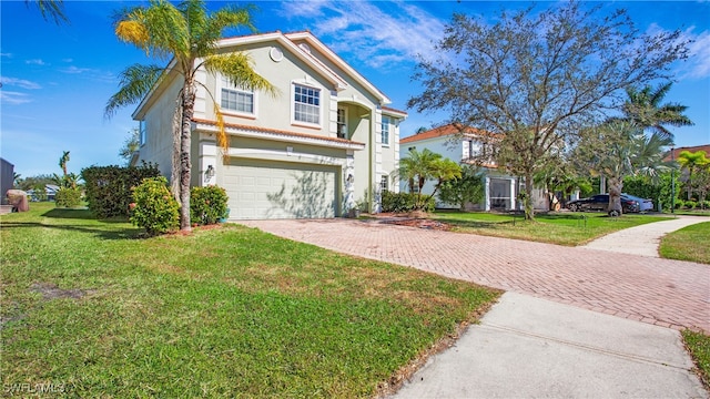 view of front of property featuring a front lawn and a garage