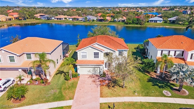 drone / aerial view featuring a water view