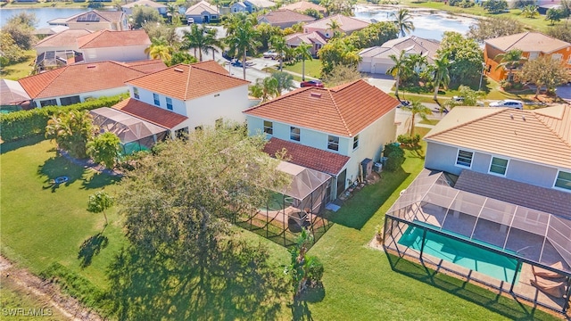 drone / aerial view with a water view