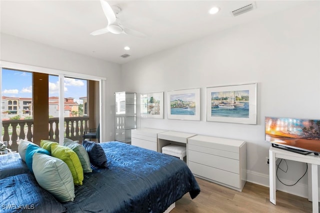 bedroom featuring access to exterior, ceiling fan, and light hardwood / wood-style floors