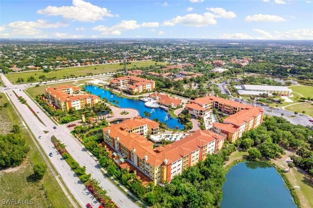 21490 Strada Nuova Cir Unit D307, Estero, FL 33928 - aerial view of apartment complex and a nearby body of water