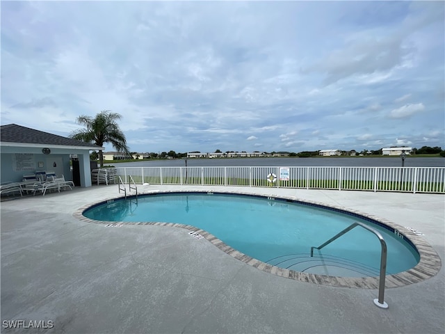 view of pool featuring a patio area