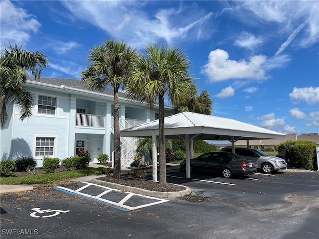 view of parking / parking lot with a carport