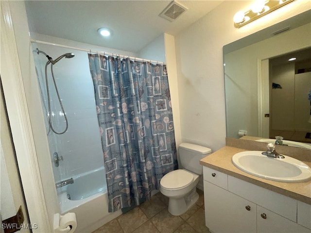 full bathroom featuring tile patterned flooring, vanity, toilet, and shower / bath combo