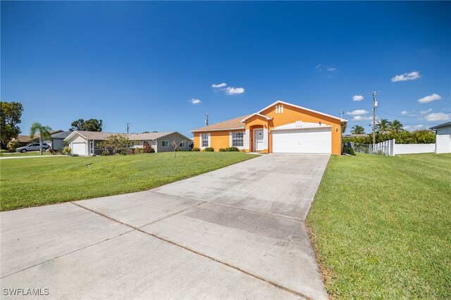 single story home with a front yard and a garage