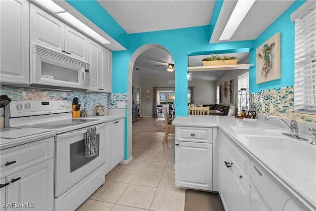 kitchen featuring ceiling fan, white appliances, sink, and white cabinets