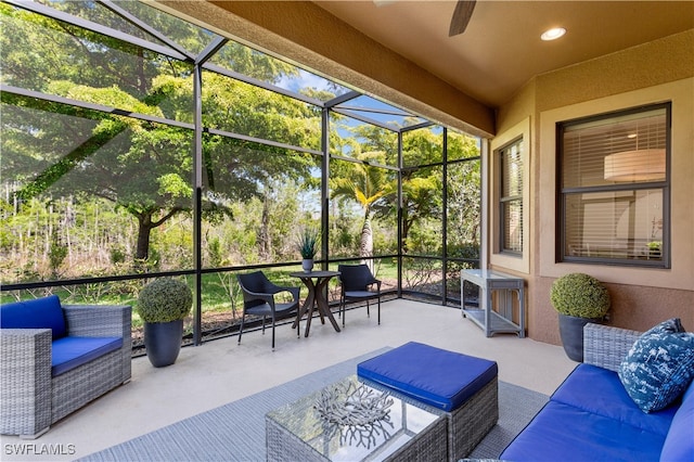 sunroom / solarium with ceiling fan