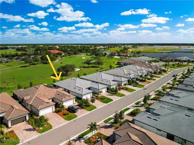 16665 Rolling Rock Blvd, Alva, FL 33920 - aerial perspective of suburban area with a large body of water and a golf club