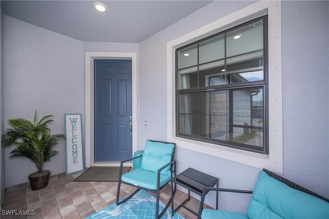 16665 Rolling Rock Blvd, Alva, FL 33920 - doorway to property with stucco siding