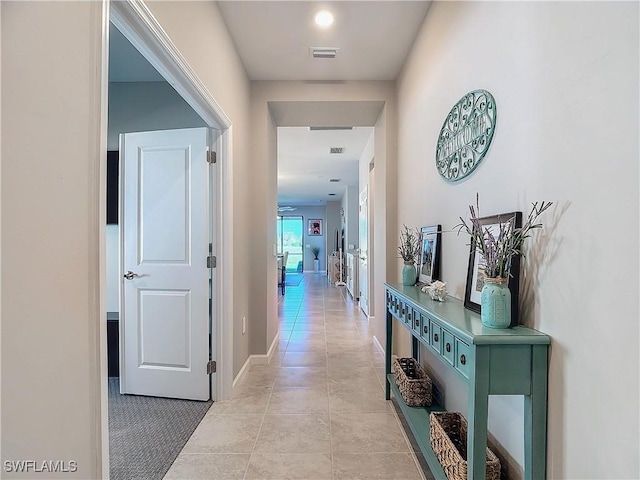 16665 Rolling Rock Blvd, Alva, FL 33920 - hall with light tile patterned flooring and baseboards