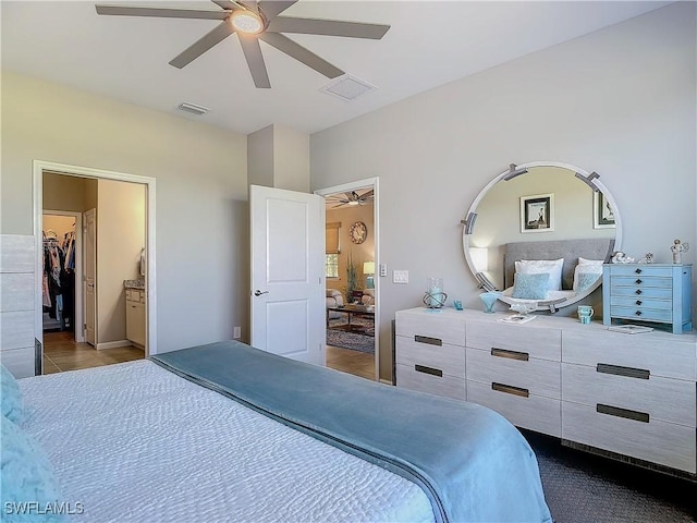 16665 Rolling Rock Blvd, Alva, FL 33920 - bedroom featuring tile patterned flooring, ceiling fan, and a walk in closet