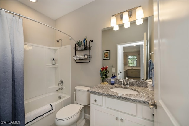 full bathroom with vanity, toilet, and shower / tub combo with curtain