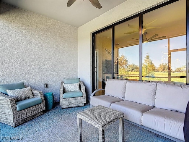 16665 Rolling Rock Blvd, Alva, FL 33920 - sunroom / solarium with ceiling fan, an outdoor hangout area, a textured wall, and carpet flooring