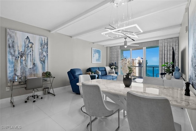 tiled dining space featuring a water view