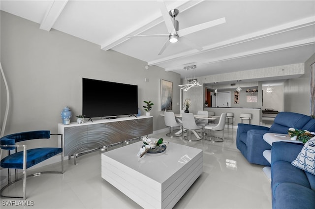 living room featuring light tile patterned flooring, beam ceiling, and ceiling fan